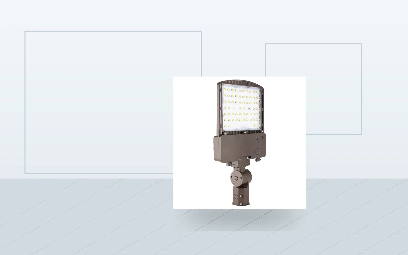 LED area lights illuminating a commercial parking lot and open site.