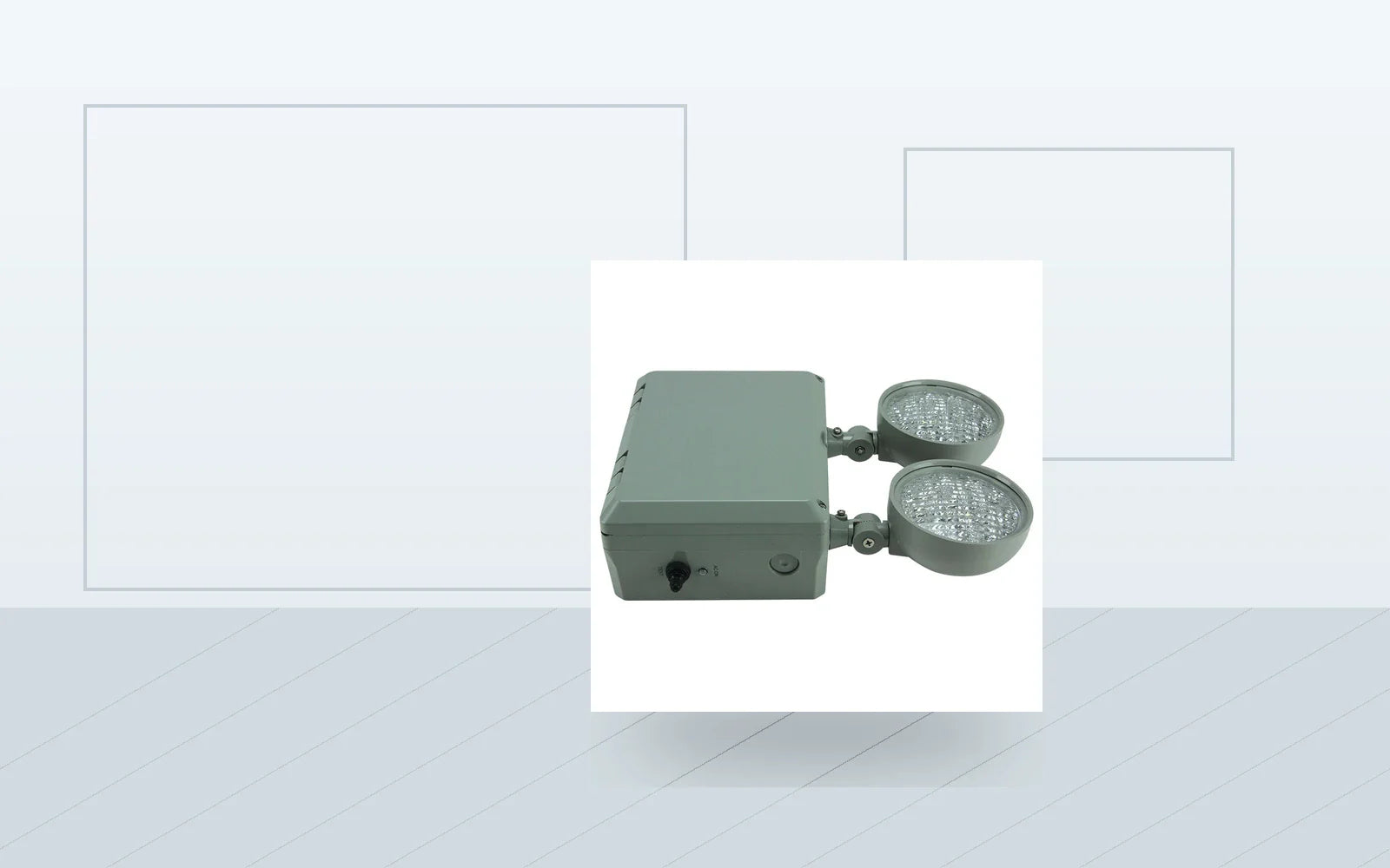 Wet-location emergency light installed for exposed commercial egress lighting.