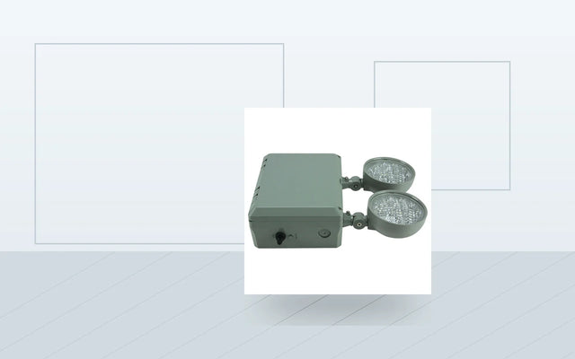 Wet-location emergency light installed for exposed commercial egress lighting.