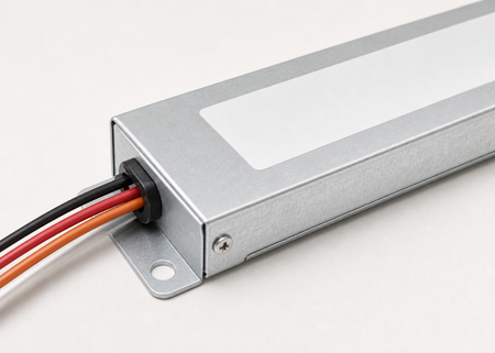 Low-profile emergency ballast wiring and mounting detail